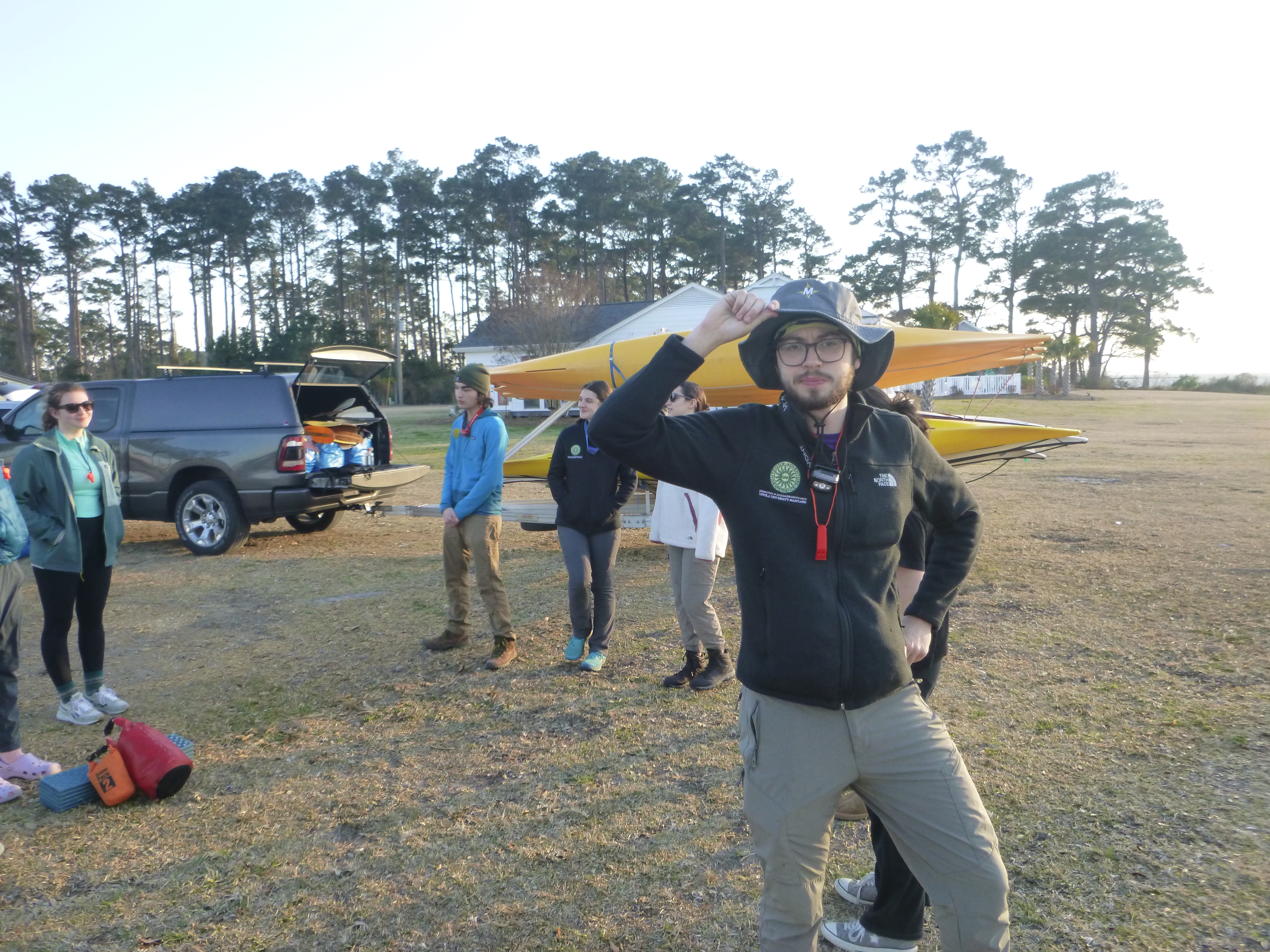Posing in front of camp